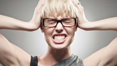 Woman-Stress-Headache-Pain-Glasses