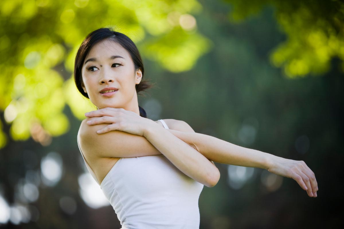 Asian-Chinese-Woman-Stretch-Before-Exercise-Run-Outside