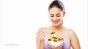 Young-Woman-Eating-Fruits-Healthy-Diet-Nutrition
